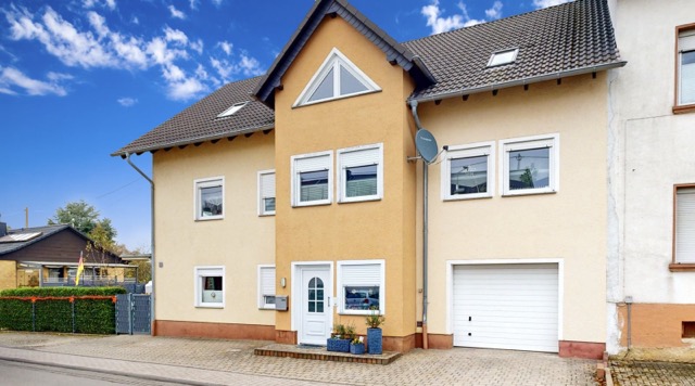 well-kept three-family house in Landscheid, independent of gas and oil in Landscheid